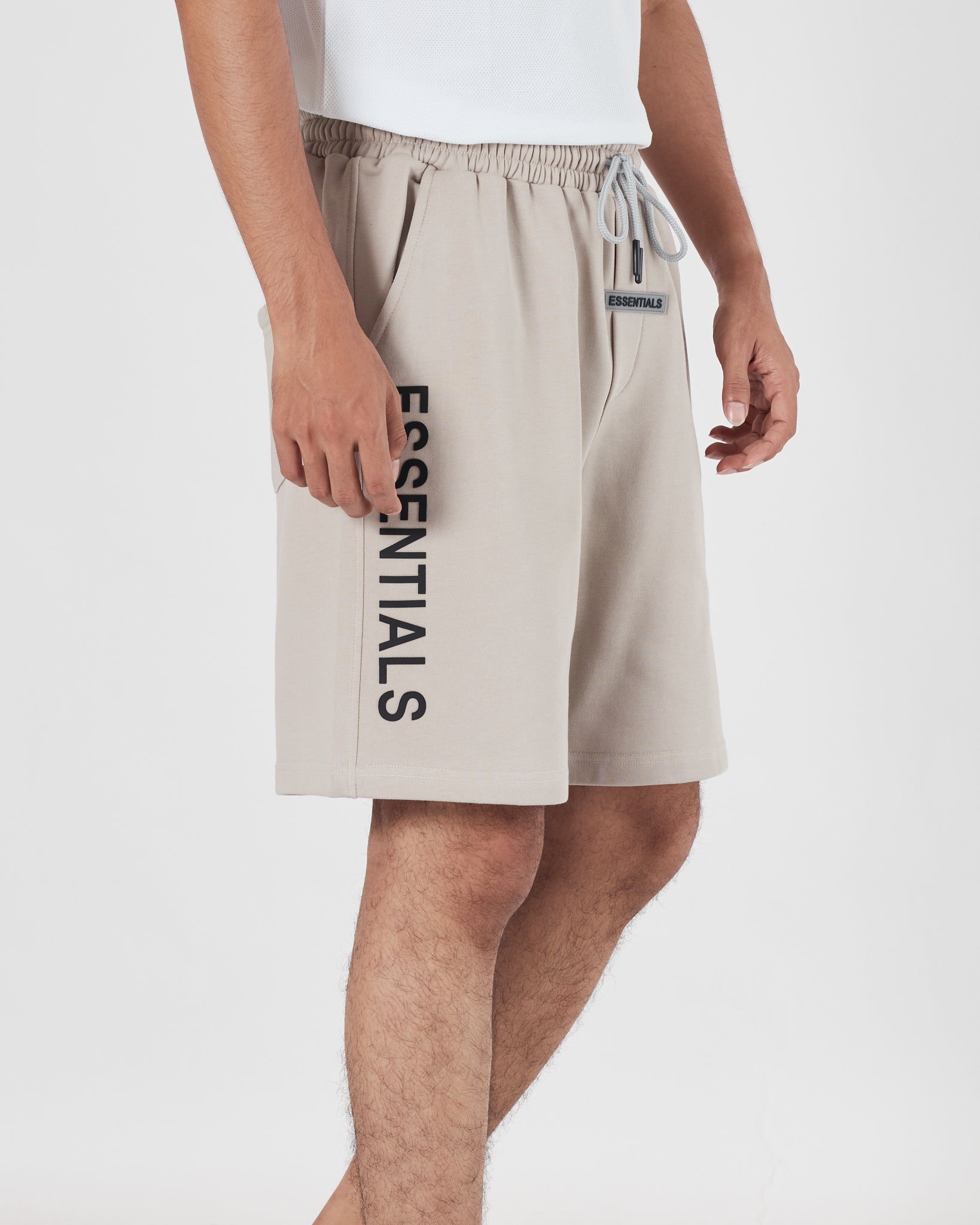 ESS Vertical Logo Printed Men Cream Shorts 16.90
