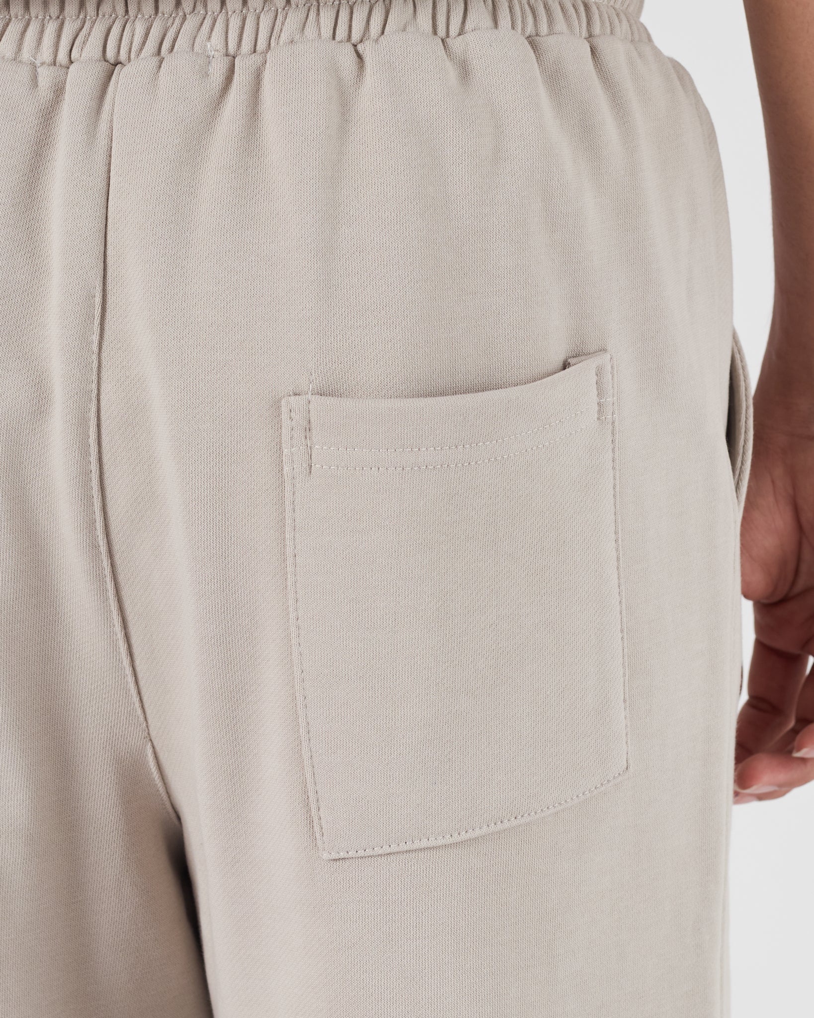 TH Signature Logo Printed Men Cream Shorts 15.90