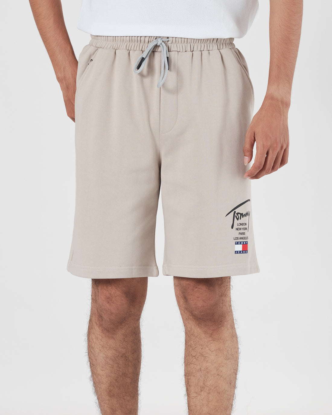 TH Signature Logo Printed Men Cream Shorts 15.90