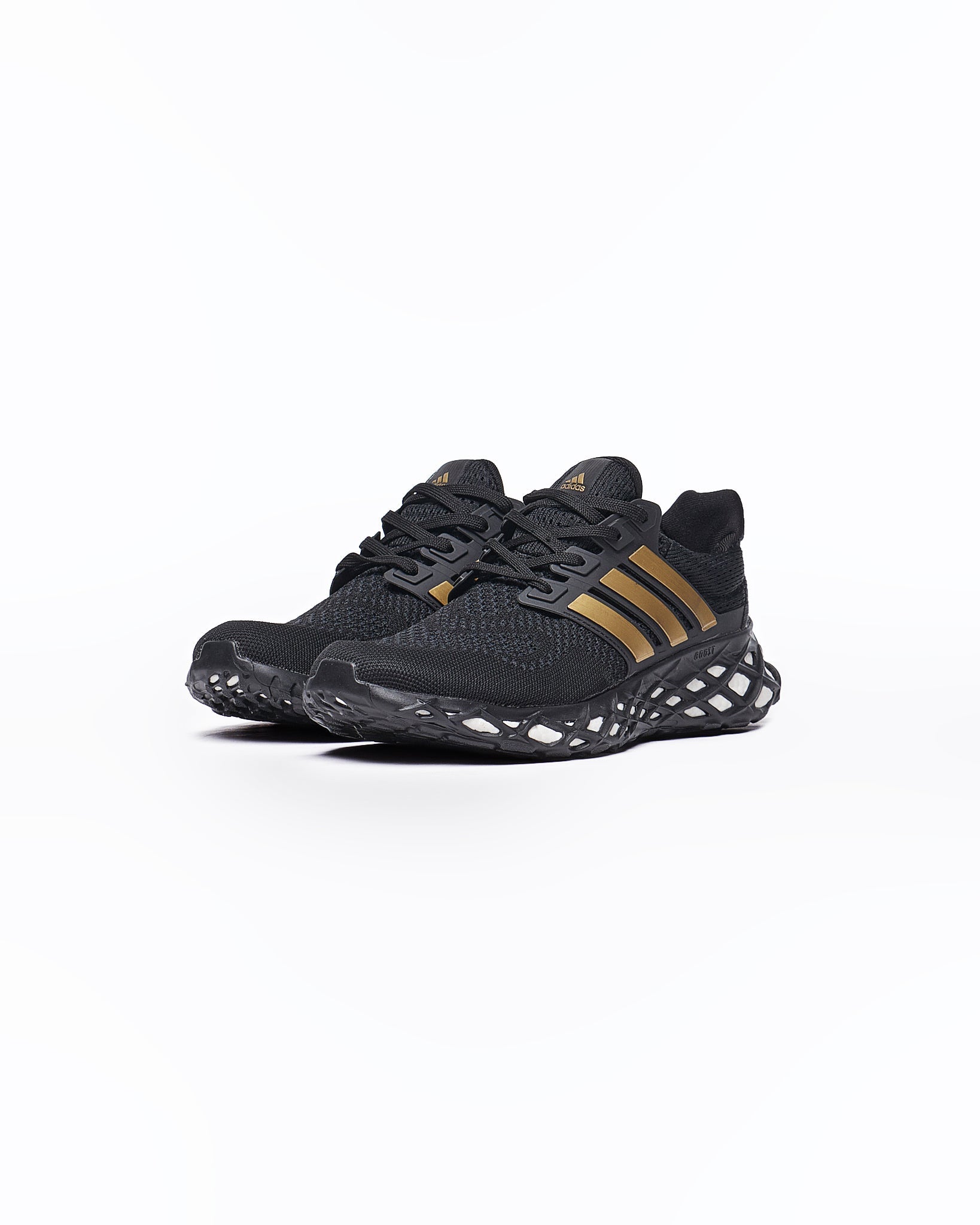 Ultra boost mens black hotsell and gold