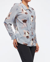 MOI OUTFIT-Cartoon Over Printed Lady Blouse 22.90