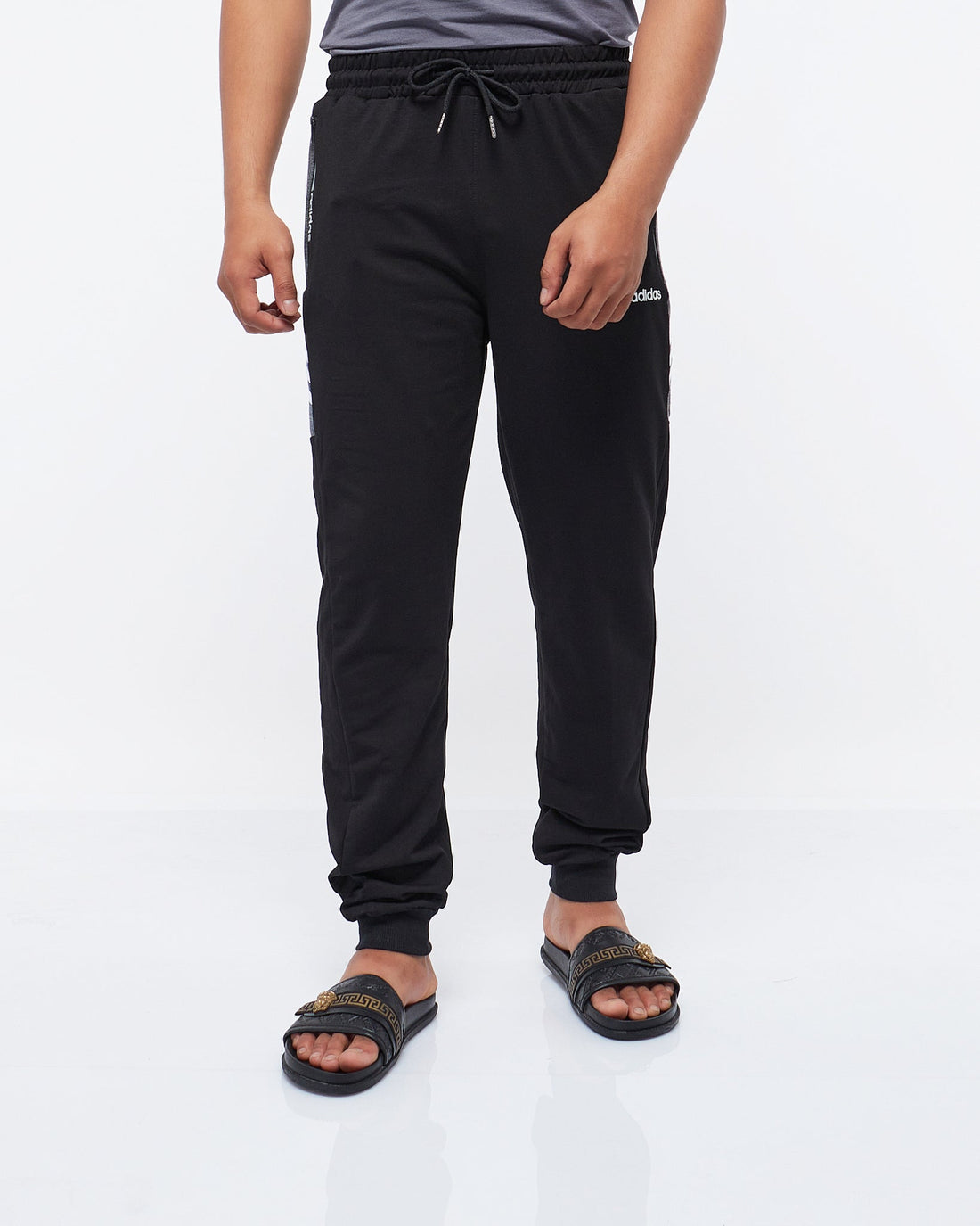 MOI OUTFIT-Side Striped Logo Printed Men Jogger 19.90